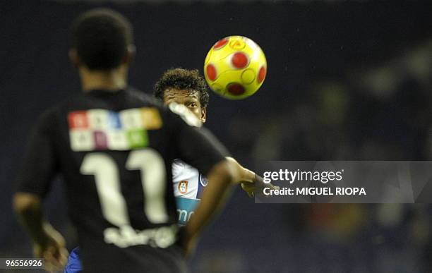 Porto's midfielder from Colombia Fredy Guarin eyes the ball during their Portuguese League Cup semi-final football match against Academica at the...