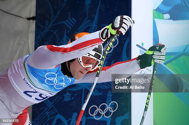 Romed Baumann of Austria practices during the Men's Downhill skiing 1st training run ahead of the Vancouver 2010 Winter Olympics on February 10, 2010...