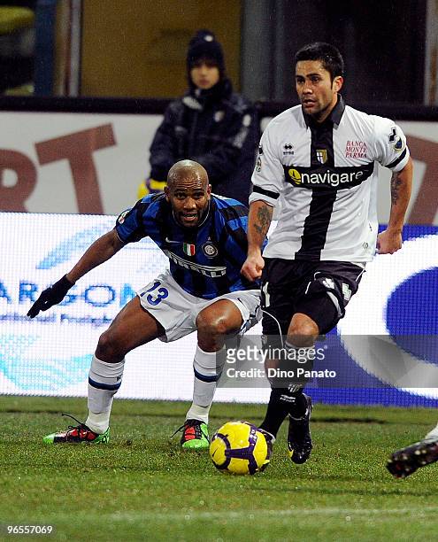 Douglas Maicon of Inter competes with Luis Jimenez of Parmaduring the Serie A match between at Parma FC and FC Internazionale Milano Ennio Tardini on...