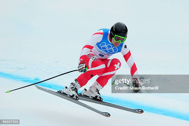 Patrick Kueng of Switzerland practices during the Men's Downhill skiing 1st training run ahead of the Vancouver 2010 Winter Olympics on February 10,...