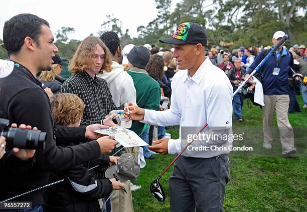 Pro surfer Kelly Slater signs autographs during the 3M Celebrity Challenge at the AT&T Pebble Beach National Pro-Am at Pebble Beach Golf Links on...