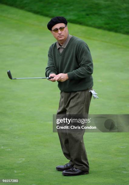 Actor Andy Garcia putts on the 17th green during the 3M Celebrity Challenge at the AT&T Pebble Beach National Pro-Am at Pebble Beach Golf Links on...