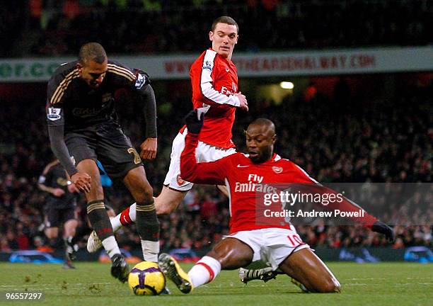 David Ngog of Liverpool is tackled by William Gallas of Arsenal during the Barclays Premier League match between Arsenal and Liverpool at Emirates...