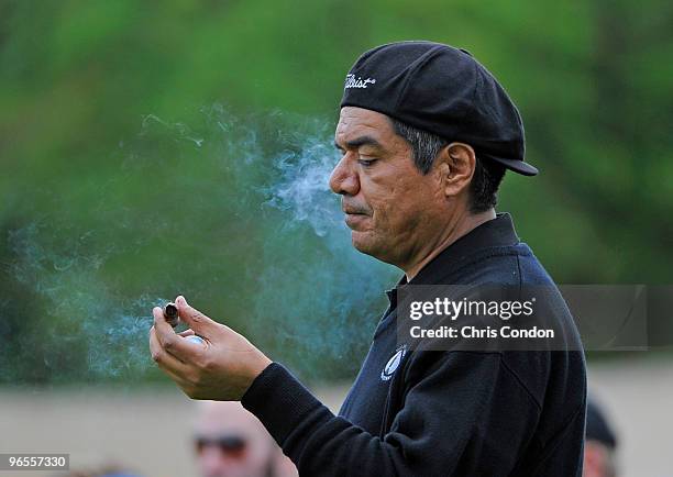 Comedian George Lopez enjoys a cigar during the 3M Celebrity Challenge at the AT&T Pebble Beach National Pro-Am at Pebble Beach Golf Links on...