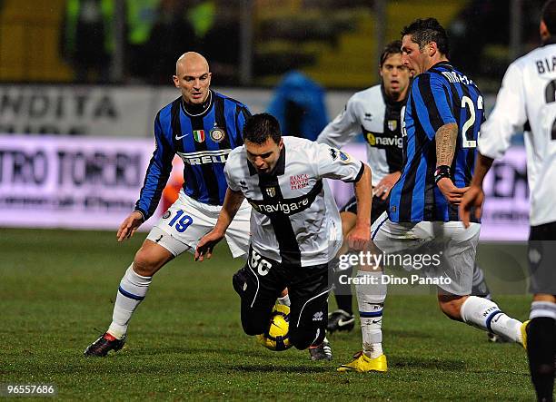 Valeri Bojinov of Parma competes with Marco Materazzi and Esteban Cambiasso of Internazionale Milano during the Serie A match between at Parma FC and...