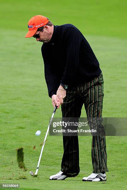 Musician Huey Lewis plays a shot during the 3M Celebrity Challenge at the AT&T Pebble Beach National Pro-Am at Pebble Beach Golf Links on February...