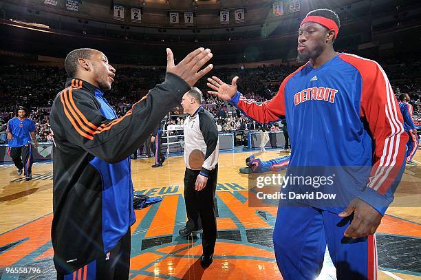 Chris Duhon of the New York Knicks greets Ben Wallace of the Detroit Pistons before the game on January 18, 2010 at Madison Square Garden in New York...