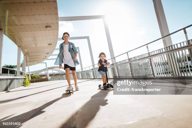 brothers on the street in brisbane - brisbane street stock pictures, royalty-free photos & images