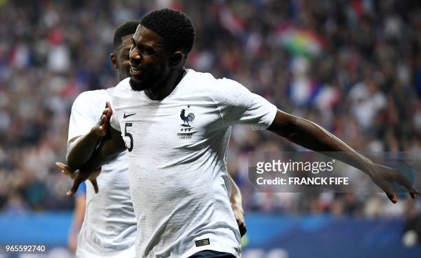 France's defender Samuel Umtiti celebrates after scoring a goal during the friendly football match between France and Italy at the Allianz Riviera...