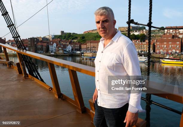 Whitby businessman and new owner Andrew Fiddler stands on the deck of HM Bark Endeavour, a replica of Captain Cook's famous ship, HMS Endeavour as it...