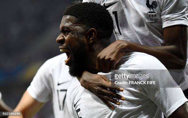 France's defender Samuel Umtiti celebrates after scoring a goal during the friendly football match between France and Italy at the Allianz Riviera...