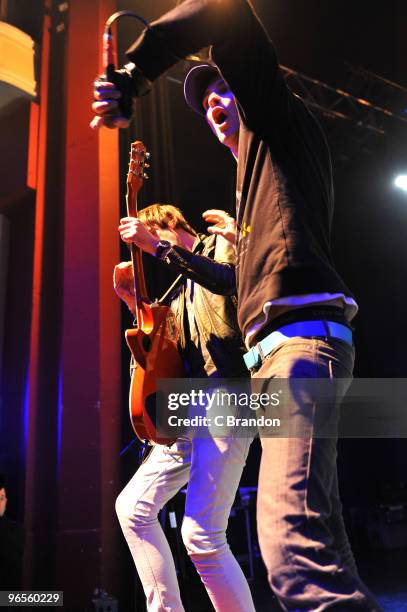 Ryland Blackinton and Gabe Saporta of Cobra Starship perform on stage at Shepherds Bush Empire on February 10, 2010 in London, England.