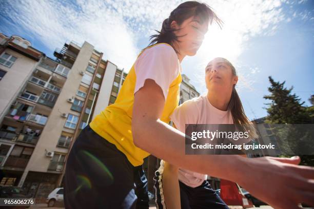 beautiful day for basketball - woman yellow basketball stock pictures, royalty-free photos & images