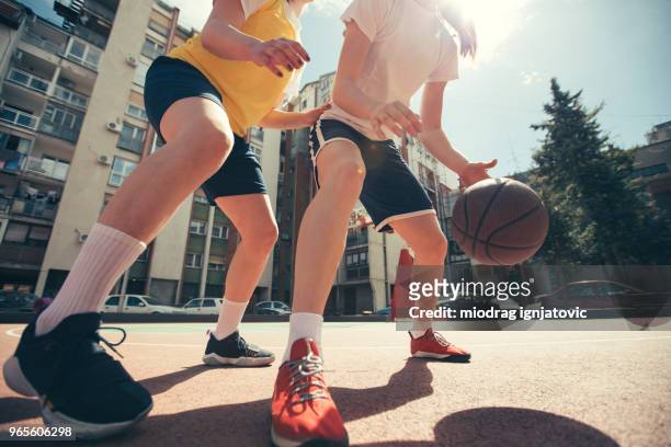 beautiful day for basketball - woman yellow basketball stock pictures, royalty-free photos & images