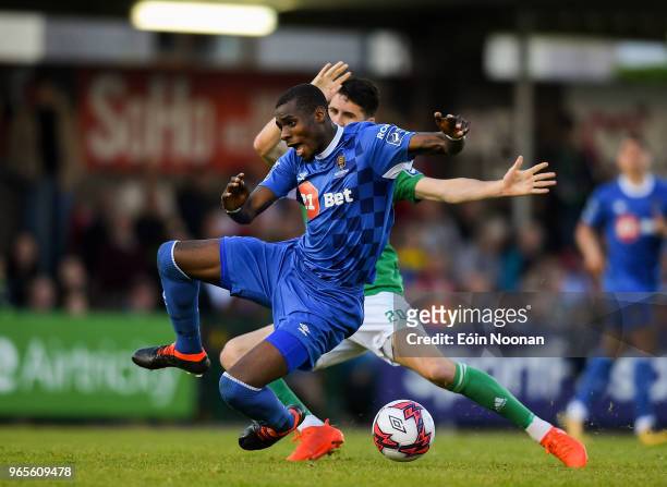Cork , Ireland - 1 June 2018; Ismahil Akinade of Waterford in action against Shane Griffin of Cork City during the SSE Airtricity League Premier...