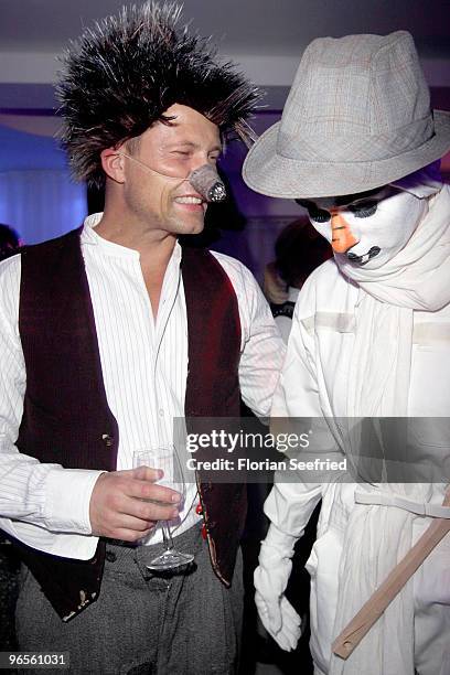 Actress Nora Tschirner as snowman and actor, director Til Schweiger as hedgehog attend the 'Zweiohrkueken Gold-Kostuemparty' at China Loung on...