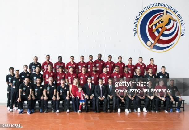 Costa Rican President Carlos Alvarado and players pose for the official photo during the swearing-in of the national football team in Gol Project, in...