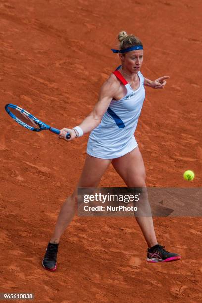 Pauline Parmentier of France returns the ball to Caroline Wozniacki of Denmark during the third round at Roland Garros Grand Slam Tournament - Day 6...