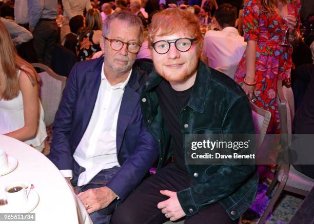 Eric Clapton and Ed Sheeran attend the Ivor Novello Awards 2018 at Grosvenor House, on May 31, 2018 in London, England.