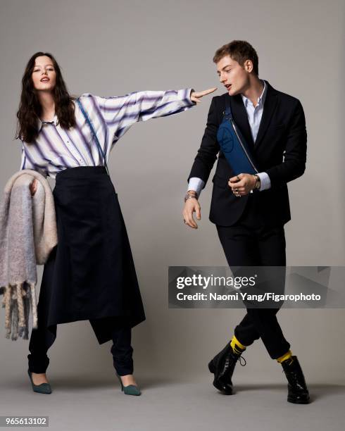 Models Alice Gilbert and Adrien Jacques pose at a fashion shoot for Madame Figaro on November 14, 2017 in Paris, France. Alice: shirt, skirt, pants,...