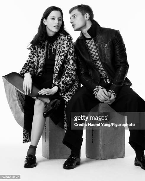 Models Alice Gilbert and Adrien Jacques pose at a fashion shoot for Madame Figaro on November 14, 2017 in Paris, France. Alice: coat by Maliparmi,...