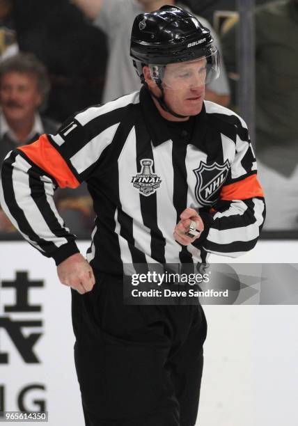 Referee Kelly Sutherland officiates Game Two of the 2018 NHL Stanley Cup Final between the Washington Capitals and the Vegas Golden Knights at...