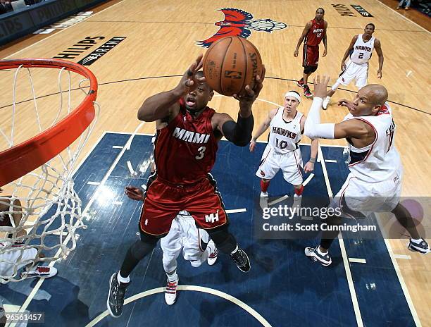 Dwyane Wade of the Miami Heat puts up a shot against the Atlanta Hawks on February 10, 2010 at Philips Arena in Atlanta, Georgia. NOTE TO USER: User...