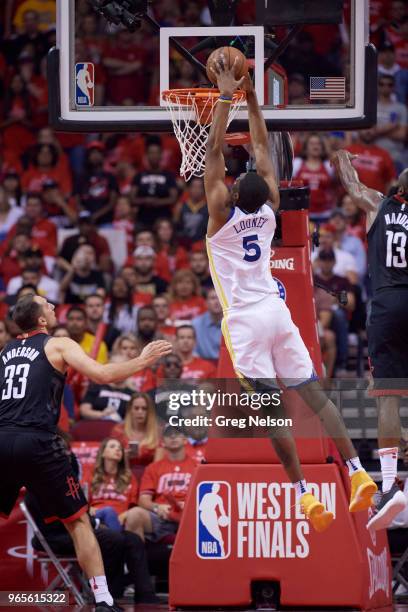 Playoffs: Rear view of Golden State Warriors Kevon Looney in action, dunking vs Houston Rockets James Harden at Toyota Center. Game 7. Houston, TX...