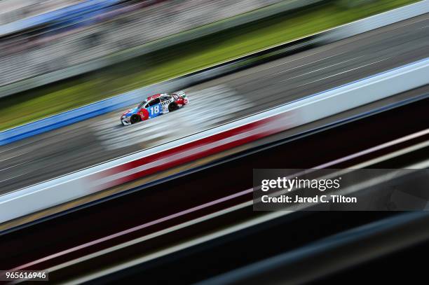 Kyle Busch, driver of the M&M's Red White & Blue Toyota, qualifies for the Monster Energy NASCAR Cup Series Pocono 400 at Pocono Raceway on June 1,...