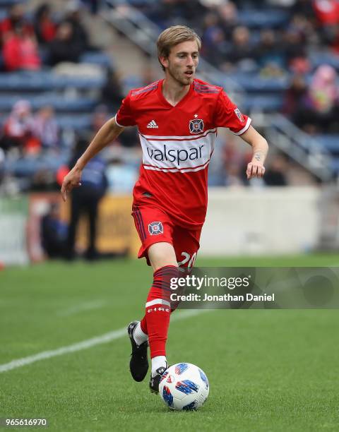 Daniel Johnson of the Chicago Fire looks to pass against the Houston Dynamo at Toyota Park on May 20, 2018 in Bridgeview, Illinois. The Dynamo...