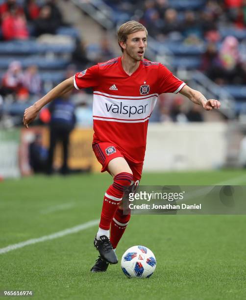 Daniel Johnson of the Chicago Fire looks to pass against the Houston Dynamo at Toyota Park on May 20, 2018 in Bridgeview, Illinois. The Dynamo...