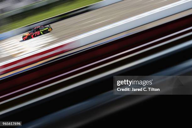 Martin Truex Jr., driver of the Bass Pro Shops/5-hour ENERGY Toyota, qualifies during qualifying for the Monster Energy NASCAR Cup Series Pocono 400...
