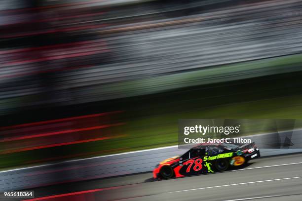 Martin Truex Jr., driver of the Bass Pro Shops/5-hour ENERGY Toyota, qualifies during qualifying for the Monster Energy NASCAR Cup Series Pocono 400...