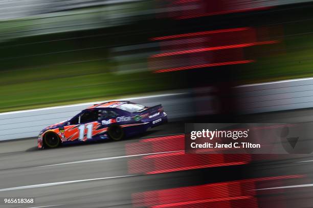 Denny Hamlin, driver of the FedEx Office Toyota, qualifies for the Monster Energy NASCAR Cup Series Pocono 400 at Pocono Raceway on June 1, 2018 in...