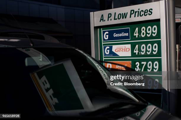 Fuel prices are displayed at a Petroleos Brasileiros SA gas station in Sao Paulo, Brazil, on Friday, June 1, 2018. Pedro Parente resigned as chief...