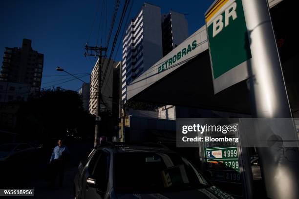 Signage is displayed at a Petroleos Brasileiros SA gas station in Sao Paulo, Brazil, on Friday, June 1, 2018. Pedro Parente resigned as chief...