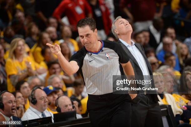 Referee David Guthrie makes a call during Game Six of the Western Conference Finals during the 2018 NBA Playoffs between the Golden State Warriors...