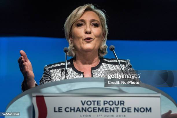 Head of the French far-right party Front national Marine Le Pen speaks as the party members backed the changing of the National Front name for...