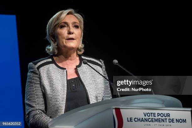 Head of the French far-right party Front national Marine Le Pen speaks as the party members backed the changing of the National Front name for...