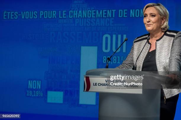 Head of the French far-right party Front national Marine Le Pen speaks as the party members backed the changing of the National Front name for...