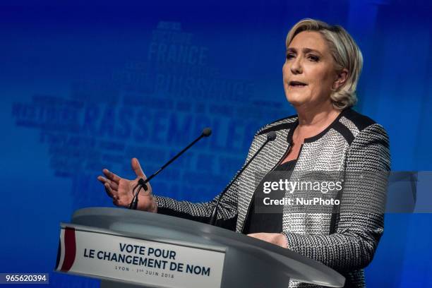 Head of the French far-right party Front national Marine Le Pen speaks as the party members backed the changing of the National Front name for...