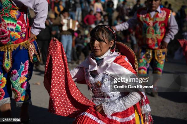 Costumed dancers parade at a chapel on the first day of the annual Qoyllur Rit'i festival on May 27, 2018 in Ocongate, Peru. Every year, since 1783...