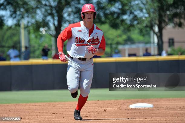 Ohio State catcher Dillon Dingler rounds second base after hitting a home run during the NCAA Baseball Greenville Regional between the South Carolina...