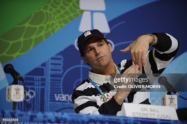 Ski team head doctor Bill Sterett gestures as he answers questions on Lyndsay Vonn shin during a press conference at Whistler Media center on...