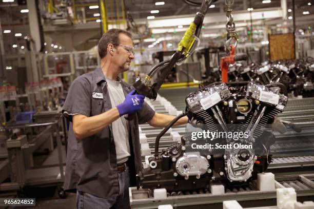 Harley-Davidson motorcycle engines are assembled at the company's Powertrain Operations plant on June 1, 2018 in Menomonee Falls, Wisconsin. The...