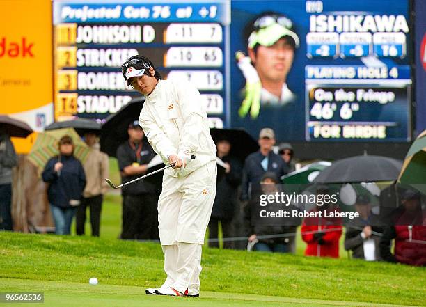 Ryo Ishikawa of Japan makes a chip shot on the fourth hole during the second round of the Northern Trust Open on February 5, 2010 at the Riviera...