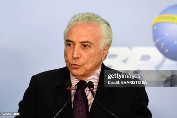 President Michel Temer makes a statement at Planalto Palace to announce Ivan Monteiro as Petrobras' new president, in Brasilia on June 1, 2018. -...