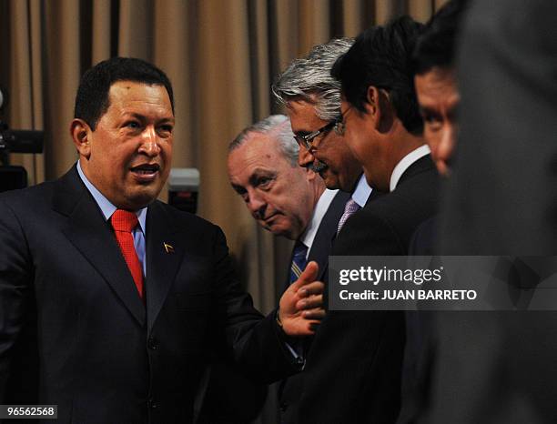 Venezuelan President Hugo Chavez speaks members of oil companies during an act in which permission was granted to participate in the development of...