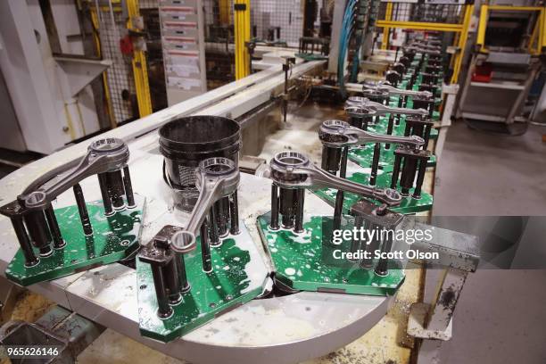 Connecting rods for Harley-Davidson motorcycle engines are machined at the company's Powertrain Operations plant on June 1, 2018 in Menomonee Falls,...