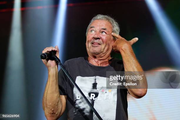 Lead singer Ian Gillan of the British rock band Deep Purple performs during a concert as part of their 'The Long Goodbye Tour' at Olympiysky Sports...